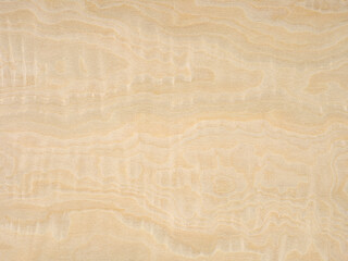 Gentle waves of sand and honey drift across the serene landscape of this birch veneer, inviting touch and admiration