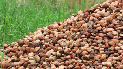 A pile of brown cobblestones