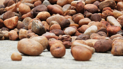 A pile of brown cobblestones