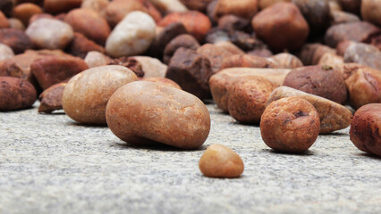 A pile of brown cobblestones