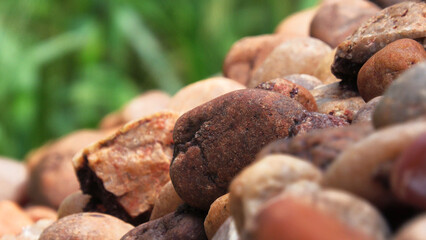 Closeup of piled brown cobblestones