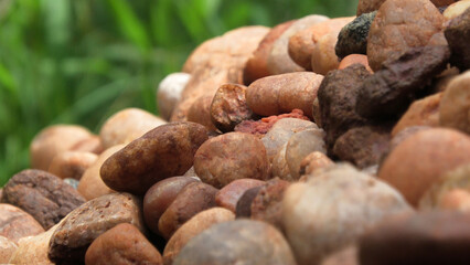 Closeup of piled brown cobblestones