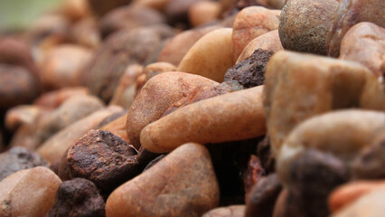 Closeup of piled brown cobblestones
