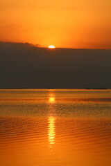 The sunrise on the shores of the Dead Sea