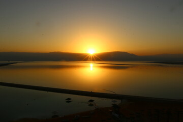 The sunrise on the shores of the Dead Sea