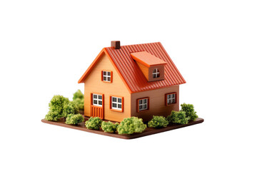 A miniature house with a red roof and green bushes. The house is isolated on a black background.