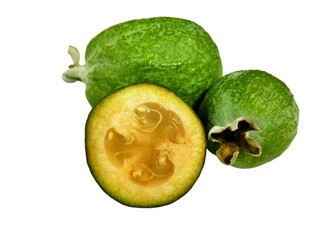 Green feijoa fruit & feijoa slice (Acca sellowiana) isolated on white background. Tropical feijoa, pineapple guava fruit exotic green fruit isolated. Raw acca sellowiana plant, guavasteen green fruit