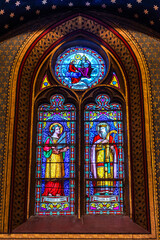 Obraz premium Stained glass window in the church of Mirepoix in Languedoc Roussillon in the south of France