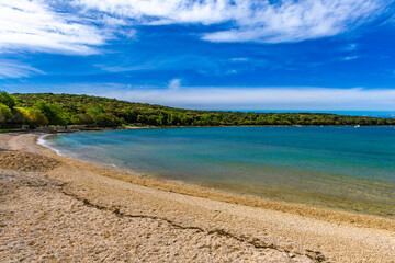 Empty rocky beaches inaccessible to tourists on the Istrian coast in Croatia, near Rovinj