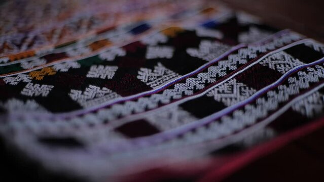 The culture and traditions of the lu mien ethnic group are reflected in their traditional clothing, which features unique decorations and creative textile patterns specific to their tribe.Thailand2023