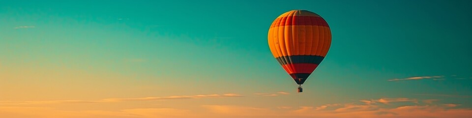 Obraz premium Serene Sunset Hot Air Balloon Ride: Embracing Adventure in a Pastel Colored Sky