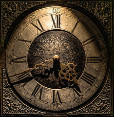 Vintage clock with brass hands