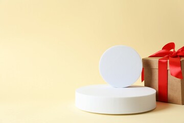 Bright gift near a podium with copy space