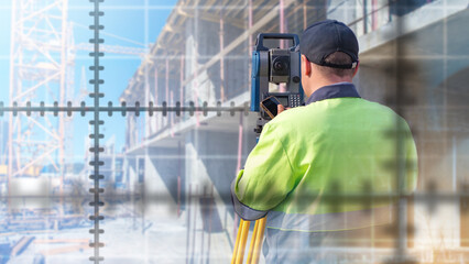 Man surveyor. Construction specialist. Topographer at work. Surveyor with back to camera. Worker...