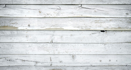 Naklejka premium White painted wood boards or siding or wall with cracks and distressed finish