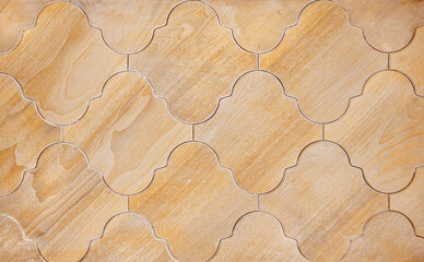 Shabby chic tile design made of wood tiles in a geometric pattern on a floor or wall