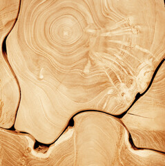 Wood working pieces of natural slab edge fit together for a background design