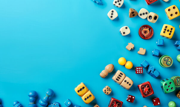 Assorted Board Game Pieces on Light Blue Background, Flat Lay, Colorful Game Components, Dice, and Meeples, Space for Text, Hobby and Leisure Concept