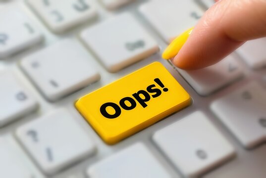 A well-manicured AI-created female finger with a yellow painted nail hovers over a yellow computer keyboard button labeled 'Oops!', indicating a minor mistake or unexpected occurrence
