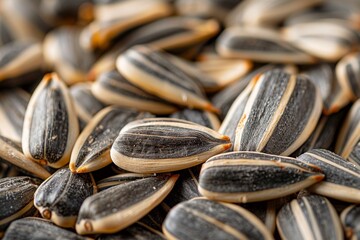 Close-up of a textured pile of sunflower seeds, a healthy and nutritious vegetarian snack