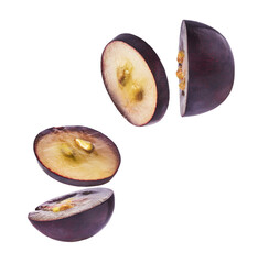 Fresh organic Blue Grape falling in the air isolated on white background. Food levitation or zero...