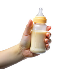 A person is holding a bottle of milk