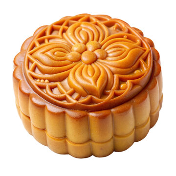 A close up of a golden mooncake with a delicate floral design on the top