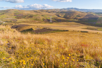 Landscape from the heights, with hills and the bright sun