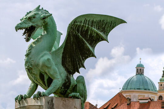 LJUBLJANA, SLOVENIA, May 07, 2023. The Dragon Bridge is one of the most recognizable and iconic landmarks of Ljubljana, the capital of Slovenia. A detail of the bridge are bronze statues of dragons. 