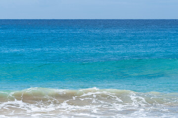 Calm aqua blue ocean scene from tropical beach vacation