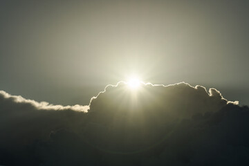Sunlight shining through clouds, giving rise to crepuscular rays，Honolulu Oahu Hawaii