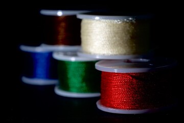 spools of thread and needle