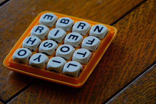 Jumbled up letters in a board game matrix with a salt timer