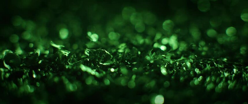 Metal filings in the emerald green light