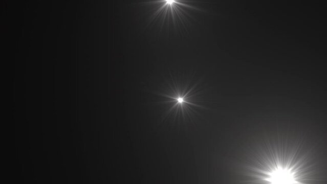 Photographer camera flashes. Random bright blinking lights. Flashing lens flares. Seamless loop