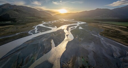 The Waiau Uwha river and mountain range at sunset. Hanmer Springs, Culverden, Canterbury, New Zealand.