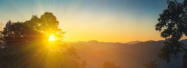 Banner Scenic view dramatic beautiful sunset sky. Panorama Natural Sunset Sunrise on meadow...
