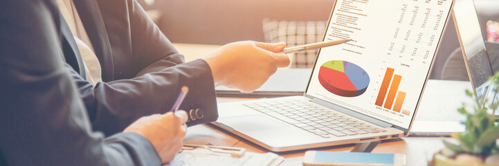 Banner Two businesspeople meeting work at office desk. Teamwork partners team with Business...