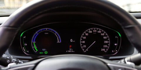  close up of the speedometer with rpm and km meter