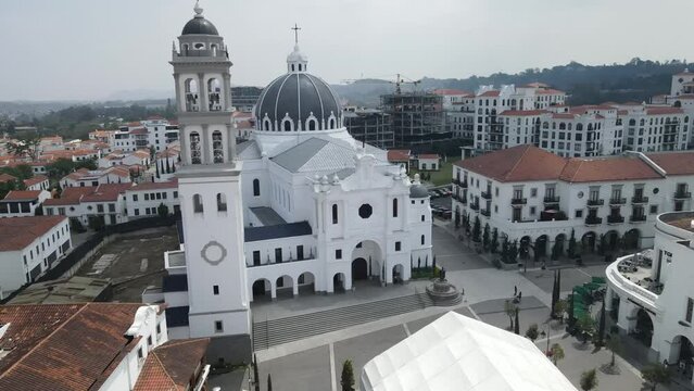 Aerial view of Cayala featuring milky white buildings with red tile roofs all open to the public