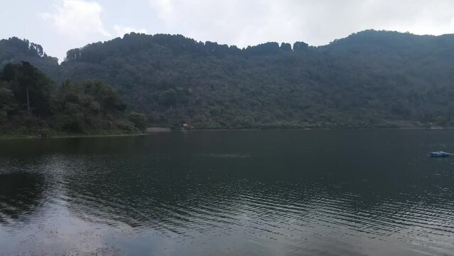 Laguna de calderas, a crater lake in the municipality of Amatitlan, Guatemala north of the active vent of the pacaya volcano