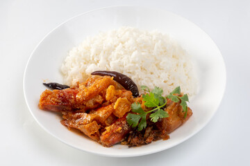 Shrimp with sauce over rice isolated on white background
