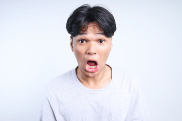 Potrait Of Funny Young Asian Man Shouting To You For Advertisement Isolated On White Background