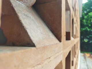 perspective view close up of red colour ventilation blocks. contemporary architecture design. Macro shoot.