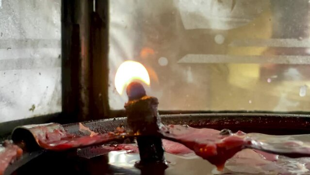 Flames under candlelight for worshiping sacred objects according to beliefs and culture in each country Region or religion, Flames under candlelight for worshiping gods, burning candle on background