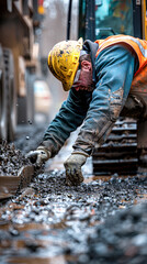 a dynamic action shot of the worker operating heavy machinery, focusing on the interaction between man and machine.
