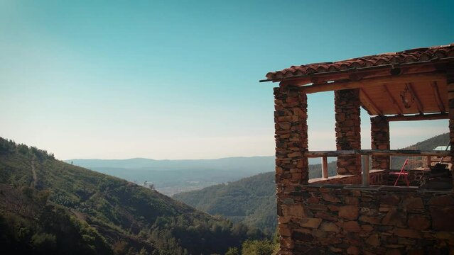 Old schist house with a beautiful porch over the mountains