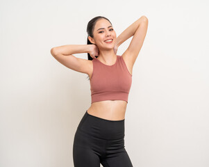 Young beautiful smiling asian woman with sportswear on isolated white background. Portrait happy healthy slim fit and firm latin attractive sporty woman standing pose exercise workout in studio.