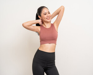 Young beautiful smiling asian woman with sportswear on isolated white background. Portrait happy healthy slim fit and firm latin attractive sporty woman standing pose exercise workout in studio.
