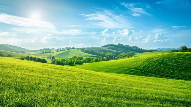 Scenic view of rolling green hills under a sunny sky with white clouds, portraying a peaceful countryside landscape.
